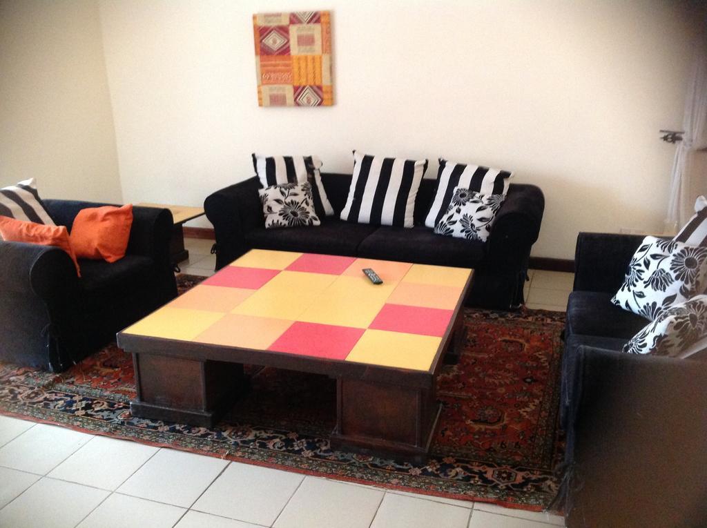 Calabash Apartment-Hotel Коту Екстериор снимка