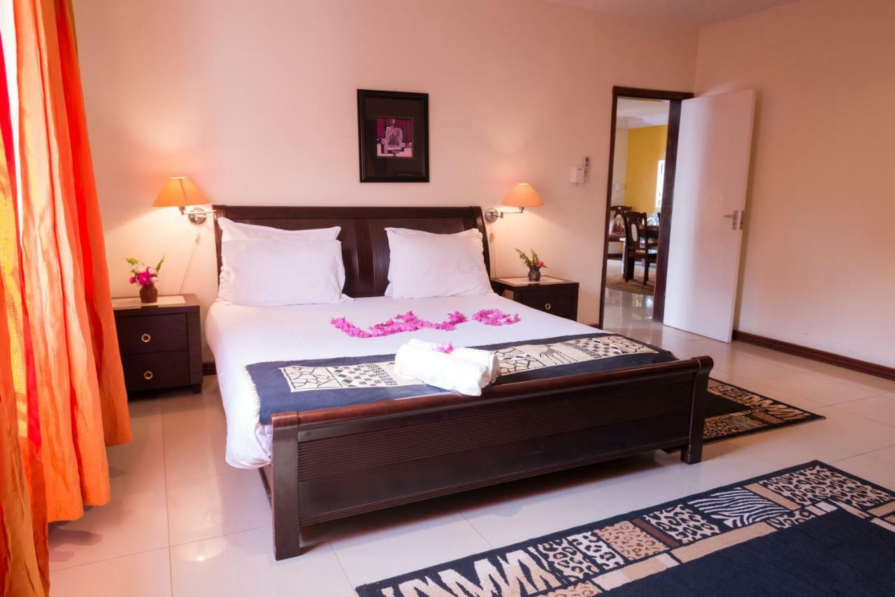 Calabash Apartment-Hotel Коту Екстериор снимка