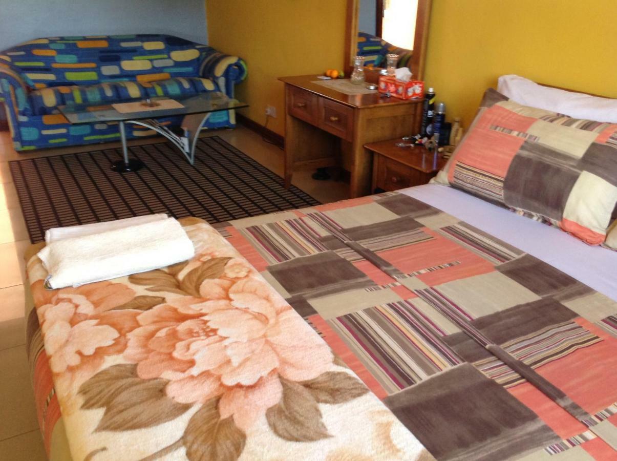 Calabash Apartment-Hotel Коту Екстериор снимка