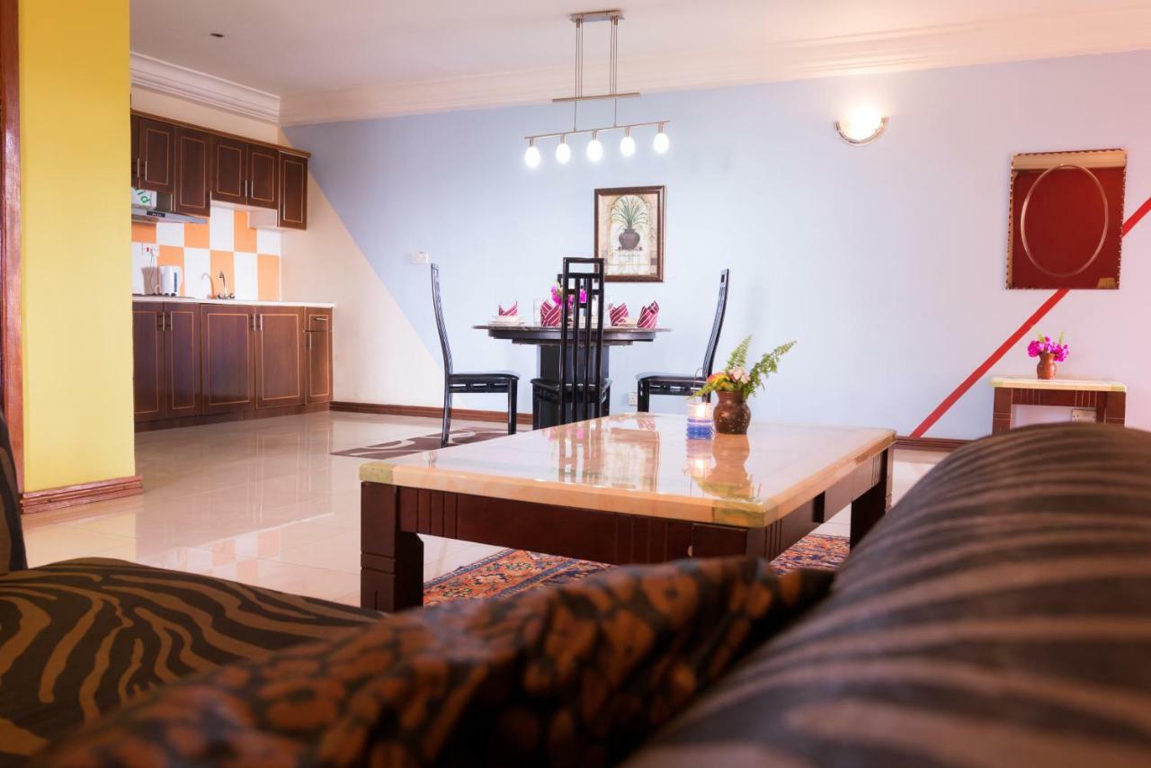 Calabash Apartment-Hotel Коту Екстериор снимка