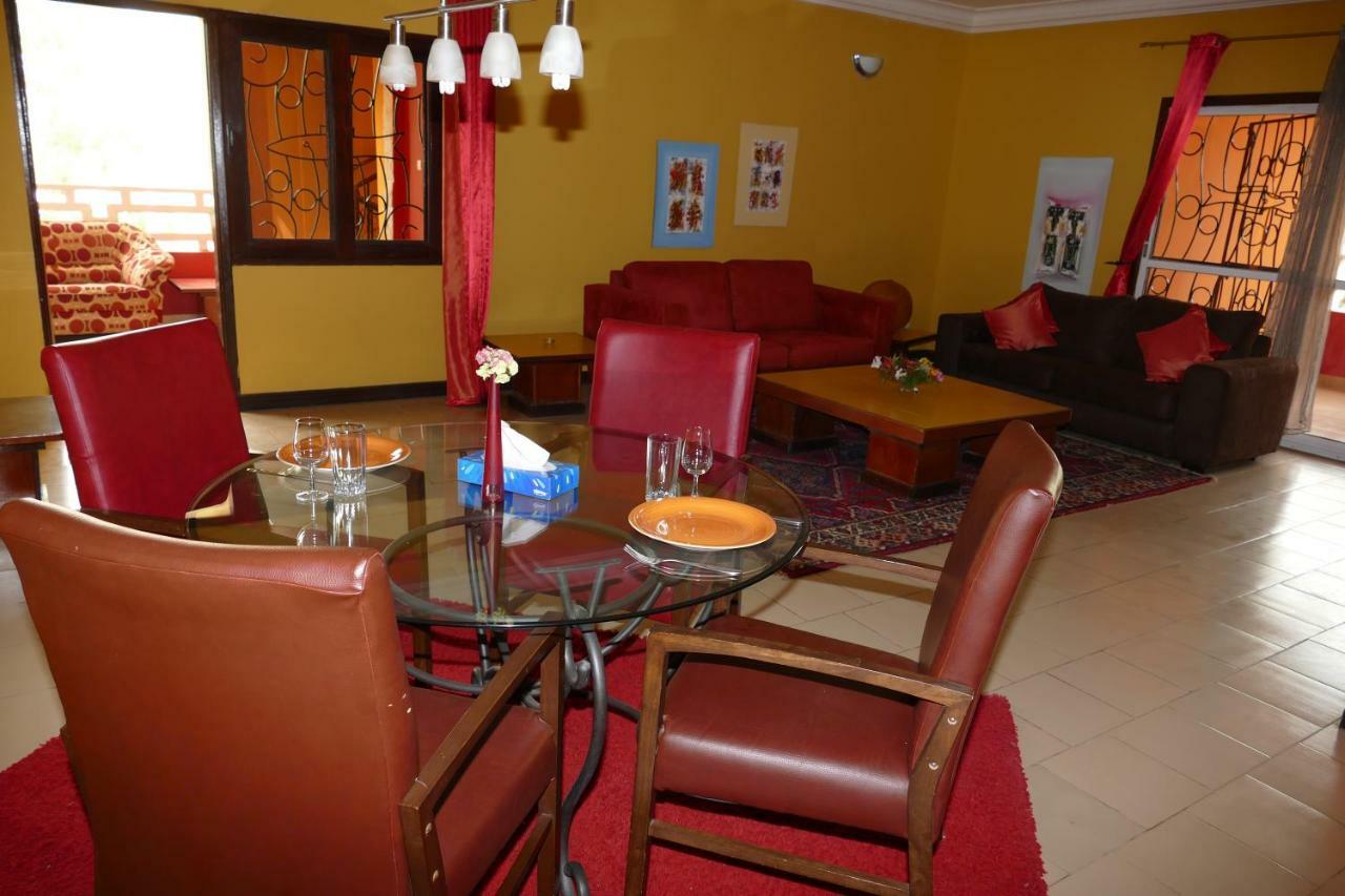 Calabash Apartment-Hotel Коту Екстериор снимка